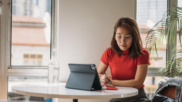 woman using iPad